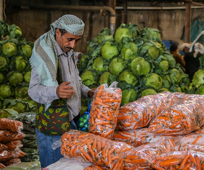 Man selling food at the market